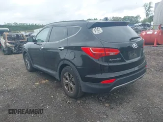 2014 Hyundai Santa Fe z VIN 5XYZUDLB9EG224174, wystawiony jako IAAI lot #42244140 z przebiegiem 84 341 mil mil oraz . Historia ofert i sprzedaży dostępna na DreamBid. Obrazek 3.