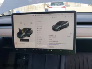 2021 Tesla Model Y Long Range with VIN 5YJYGDEE2MF300009, listed as a IAAI auction lot 41768784 with 50,107 mi miles. Bid and sale history available at carsss.com. Image 7.