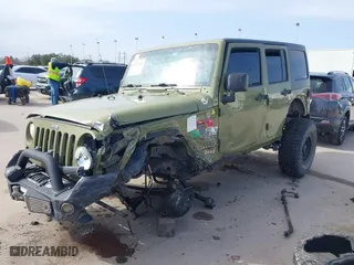 2013 Jeep Wrangler Unlimited Sahara with VIN 1C4BJWEG8DL704658, listed as a IAAI auction lot 41576743 with 212,767 mi miles. Bid and sale history available at carsss.com. Image 20.