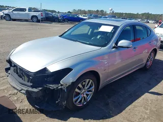 2017 Infiniti Q70 3.7 with VIN JN1BY1AP3HM740250, listed as a IAAI auction lot 41858552 with 173,907 mi miles and . Bid and sale history available at DreamBid. Image 20.