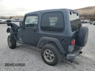 2003 Jeep Wrangler SE with VIN 1J4FA29113P351844, listed as a Copart auction lot 81411324 with 53,525 mi miles and Salvage title. Bid and sale history available at DreamBid. Image 2.