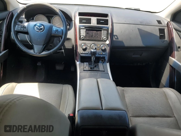 2015 Mazda CX-9 Grand Touring z VIN JM3TB2DA3F0452160, wystawiony jako Copart lot #60220655 z przebiegiem 145 185 mil mil oraz Szkoda całkowita • Salvage title. Historia ofert i sprzedaży dostępna na DreamBid. Obrazek 8.