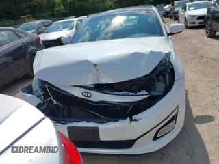 2015 Kia Optima EX with VIN 5XXGN4A77FG497218, listed as a IAAI auction lot 42464839 with 128,355 mi miles and . Bid and sale history available at DreamBid. Image 12.