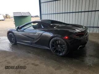 2018 McLaren 570S z VIN SBM13FAA1JW004280, wystawiony jako Copart lot #63609654 z przebiegiem 22 596 mil mil oraz Szkody całkowita. Historia ofert i sprzedaży dostępna na DreamBid. Obrazek 2.