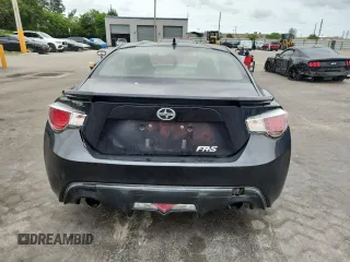 2015 Scion FR-S z VIN JF1ZNAA12F8711821, wystawiony jako Copart lot #59886505 z przebiegiem 115 796 mil mil oraz Szkoda całkowita • Salvage title. Historia ofert i sprzedaży dostępna na DreamBid. Obrazek 6.
