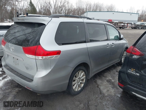 2012 Toyota Sienna XLE with VIN 5TDDK3DC9CS037616, listed as a IAAI auction lot 41435361 with 250,043 mi miles. Bid and sale history available at carsss.com. Image 4.