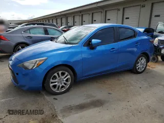 2016 Scion iA z VIN 3MYDLBZVXGY136365, wystawiony jako Copart lot #58978555 z przebiegiem 180 823 mil mil oraz Tytuł czysty. Historia ofert i sprzedaży dostępna na DreamBid. Obrazek 1.
