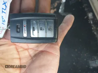 2015 Acura TLX z VIN 19UUB1F34FA022686, wystawiony jako IAAI lot #41975685 z przebiegiem 144 503 mil mil oraz . Historia ofert i sprzedaży dostępna na DreamBid. Obrazek 11.