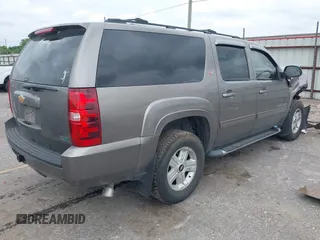 2012 Chevrolet Suburban LT with VIN 1GNSKJE78CR131456, listed as a IAAI auction lot 42152241 with 215,790 mi miles and . Bid and sale history available at DreamBid. Image 4.