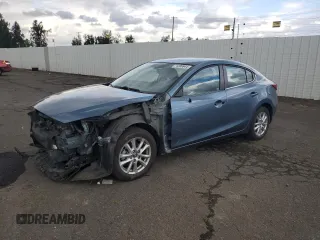 2016 Mazda 3 i Touring with VIN JM1BM1W71G1285237, listed as a Copart auction lot 71208844 with 94,534 mi miles and Salvage Title. Bid and sale history available at carsss.com. Image 1.