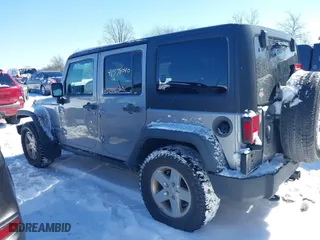 2013 Jeep Wrangler Unlimited Sport with VIN 1C4BJWDGXDL651995, listed as a IAAI auction lot 41578040 with 114,698 mi miles. Bid and sale history available at carsss.com. Image 14.