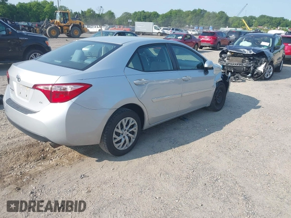 2018 Toyota Corolla L with VIN 2T1BURHE6JC100175, listed as a IAAI auction lot 42405737 with 123,183 mi miles and . Bid and sale history available at DreamBid. Image 4.