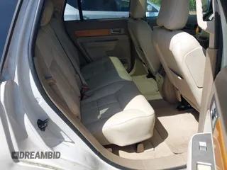 2007 Lincoln MKX z VIN 2LMDU68C67BJ32292, wystawiony jako IAAI lot #42165581 z przebiegiem 199 874 mil mil oraz . Historia ofert i sprzedaży dostępna na DreamBid. Obrazek 8.