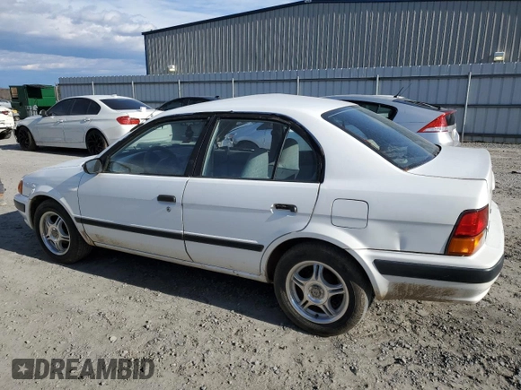 1997 Toyota Tercel DX z VIN JT2BC52L5V0215622, wystawiony jako Copart lot #87475544 z przebiegiem 382 242 mil mil oraz Szkoda całkowita • Salvage title. Historia ofert i sprzedaży dostępna na DreamBid. Obrazek 2.