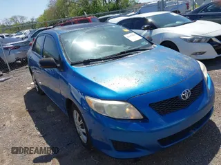 2009 Toyota Corolla with VIN 1NXBU40EX9Z065519, listed as a IAAI auction lot 42057981 with 201,480 mi miles. Bid and sale history available at carsss.com. Image 1.