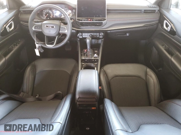 2025 Jeep Compass Trailhawk with VIN 3C4NJDDN3ST557667, listed as a Copart auction lot 65611635 with 8,984 mi miles and Clean title. Bid and sale history available at DreamBid. Image 8.