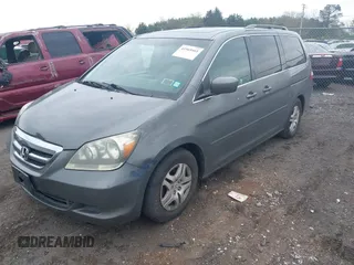 2007 Honda Odyssey EX-L with VIN 5FNRL38777B074397, listed as a IAAI auction lot 41965461 with 210,696 mi miles. Bid and sale history available at carsss.com. Image 2.