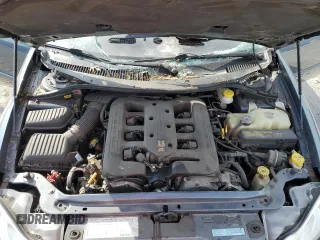2001 Chrysler LHS z VIN 2C3AC56G61H589389, wystawiony jako Copart lot #58993363 z przebiegiem 175 064 mil mil oraz Szkody całkowita. Historia ofert i sprzedaży dostępna na DreamBid. Obrazek 11.