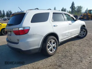 2013 Dodge Durango Crew with VIN 1C4RDJDG3DC664855, listed as a IAAI auction lot 42109159 with 148,440 mi miles and . Bid and sale history available at DreamBid. Image 4.