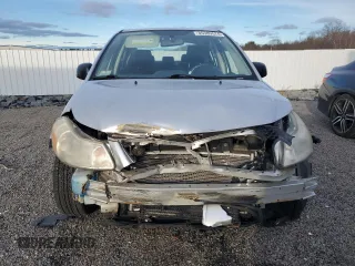 2011 Suzuki SX4 LE with VIN JS2YC5A23B6300189, listed as a Copart auction lot 85389574 with 71,272 mi miles and Clean Title. Bid and sale history available at carsss.com. Image 5.