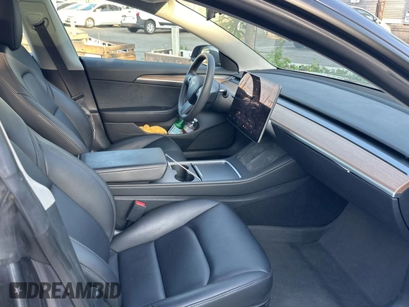 2023 Tesla Model 3 with VIN 5YJ3E1EA1PF607137, listed as a Copart auction lot 62613375 with 27,271 mi miles and Clean title. Bid and sale history available at DreamBid. Image 5.