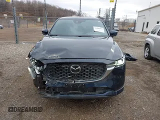 2023 Mazda CX-5 Signature with VIN JM3KFBXY5P0251046, listed as a IAAI auction lot 41505815 with 37,594 mi miles and . Bid and sale history available at carsss.com. Image 12.
