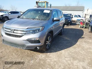 2017 Honda Pilot EX-L with VIN 5FNYF6H50HB059096, listed as a IAAI auction lot 41757214 with 165,651 mi miles and . Bid and sale history available at DreamBid. Image 17.