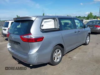 2015 Toyota Sienna L with VIN 5TDZK3DCXFS594786, listed as a IAAI auction lot 42292618 with 180,119 mi miles and . Bid and sale history available at DreamBid. Image 4.