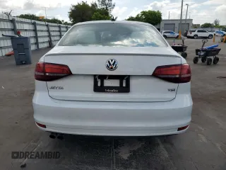 2017 Volkswagen Jetta Sport z VIN 3VWD17AJ6HM354058, wystawiony jako Copart lot #58650755 z przebiegiem 72 089 mil mil oraz Szkoda całkowita • Salvage title. Historia ofert i sprzedaży dostępna na DreamBid. Obrazek 6.
