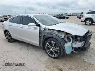 2019 Ford Fusion Titanium with VIN 3FA6P0D99KR105398, listed as a Copart auction lot 54786845 with 122,776 mi miles and Salvage title. Bid and sale history available at DreamBid. Image 4.