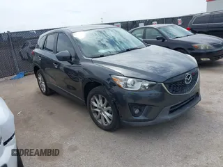 2014 Mazda CX-5 Grand Touring with VIN JM3KE2DY0E0354220, listed as a IAAI auction lot 41885502 with 168,901 mi miles. Bid and sale history available at carsss.com. Image 1.