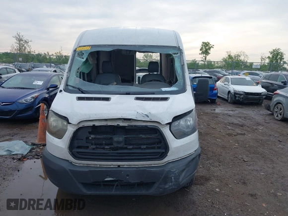 2018 Ford Transit z VIN 1FTYR2CM9JKB14054, wystawiony jako IAAI lot #42205733 z przebiegiem 263 605 mil mil oraz . Historia ofert i sprzedaży dostępna na DreamBid. Obrazek 12.