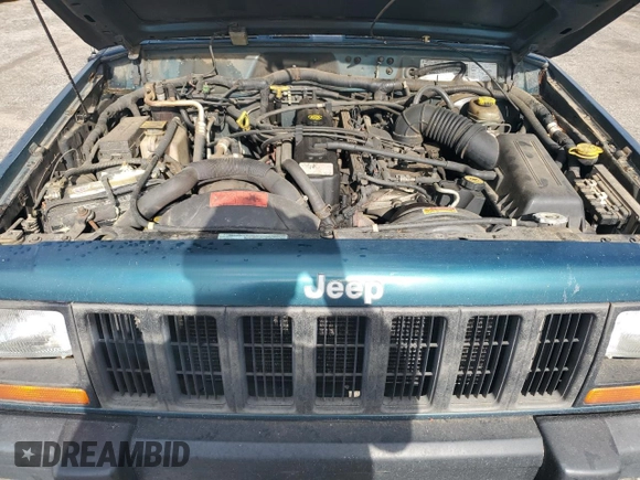 1998 Jeep Cherokee Sport with VIN 1J4FJ68S9WL249365, listed as a Copart auction lot 58896155 with 344,530 mi miles and Clean title. Bid and sale history available at DreamBid. Image 12.