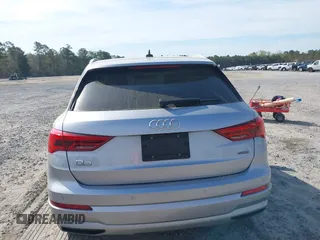 2020 Audi Q3 Premium with VIN WA1AECF36L1057823, listed as a IAAI auction lot 41912118 with 71,004 mi miles and . Bid and sale history available at DreamBid. Image 16.