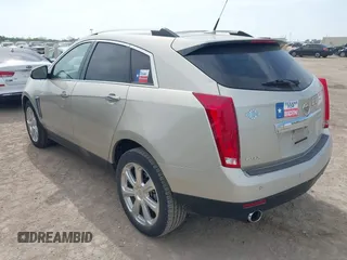 2013 Cadillac SRX Performance Collection with VIN 3GYFNDE34DS634099, listed as a IAAI auction lot 41931125 with 134,318 mi miles and . Bid and sale history available at carsss.com. Image 3.
