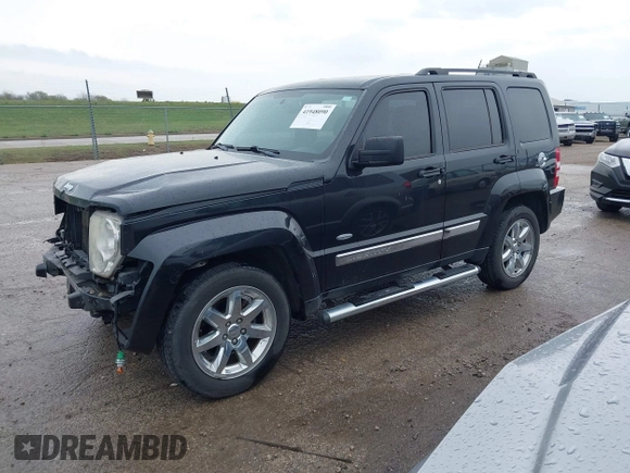 2012 Jeep Liberty Sport with VIN 1C4PJMAKXCW192564, listed as a IAAI auction lot 41948090 with 156,027 mi miles. Bid and sale history available at carsss.com. Image 2.