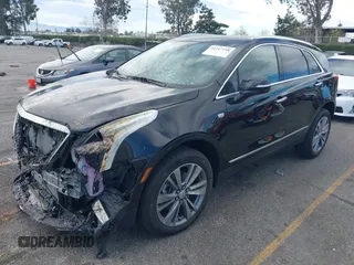 2024 Cadillac XT5 FWD Premium Luxury with VIN 1GYKNCRS6RZ745077, listed as a IAAI auction lot 41247248 with 3,302 mi miles. Bid and sale history available at carsss.com. Image 2.