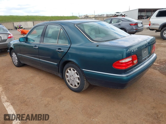 1996 Mercedes-Benz E-Class with VIN WDBJF55F7TJ022572, listed as a IAAI auction lot 41936649 with 187,706 mi miles. Bid and sale history available at carsss.com. Image 3.