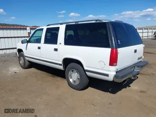1999 Chevrolet Suburban with VIN 3GNFK16R4XG227995, listed as a IAAI auction lot 42034142 with 241,792 mi miles. Bid and sale history available at carsss.com. Image 3.
