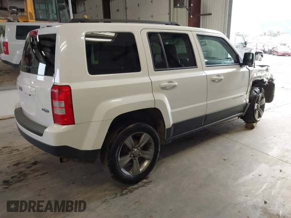 2014 Jeep Patriot Latitude with VIN 1C4NJPFA0ED680509, listed as a IAAI auction lot 41801775 with 147,418 mi miles and . Bid and sale history available at carsss.com. Image 4.