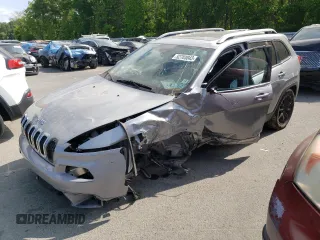 2016 Jeep Cherokee Limited with VIN 1C4PJMDB0GW112352, listed as a Copart auction lot 52703043 with 60,642 mi miles and Salvage title. Bid and sale history available at DreamBid. Image 1.
