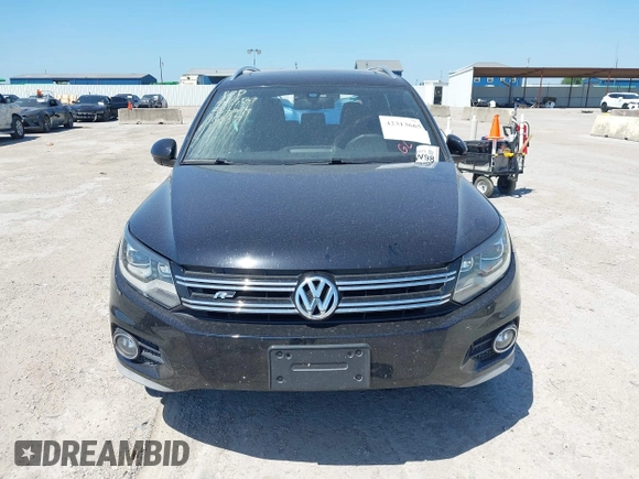 2014 Volkswagen Tiguan SEL with VIN WVGAV3AX4EW025339, listed as a IAAI auction lot 42313665 with 96,756 mi miles and . Bid and sale history available at DreamBid. Image 12.