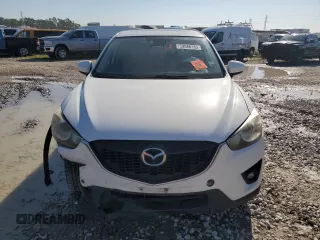 2015 Mazda CX-5 Grand Touring with VIN JM3KE2DY1F0453386, listed as a Copart auction lot 50580185 with 174,309 mi miles and Salvage Title. Bid and sale history available at carsss.com. Image 5.