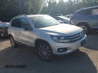 2014 Volkswagen Tiguan SEL with VIN WVGAV3AX2EW554773, listed as a IAAI auction lot 42547252 with 162,573 mi miles and . Bid and sale history available at DreamBid. Image 1.