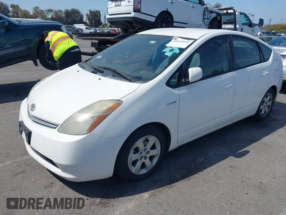 2006 Toyota Prius with VIN JTDKB20UX67527206, listed as a IAAI auction lot 42093925 with 124,256 mi miles. Bid and sale history available at carsss.com. Image 2.