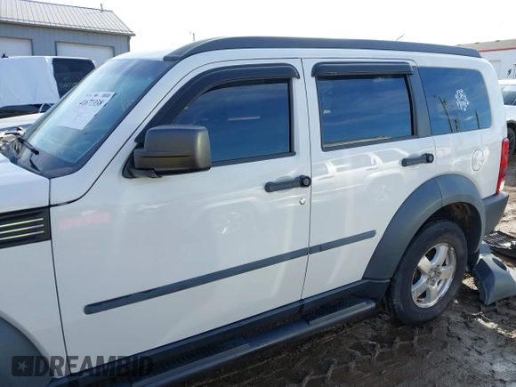 2008 Dodge Nitro SXT with VIN 1D8GU28K18W113714, listed as a IAAI auction lot 41671938 with 118,629 mi miles. Bid and sale history available at carsss.com. Image 15.