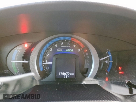 2010 Honda Insight EX z VIN JHMZE2H72AS038002, wystawiony jako Copart lot #58484365 z przebiegiem 178 670 mil mil oraz Szkoda całkowita • Salvage title. Historia ofert i sprzedaży dostępna na DreamBid. Obrazek 9.
