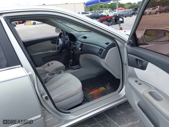 2007 Kia Optima LX with VIN KNAGE123175135348, listed as a IAAI auction lot 41887004 with 149,094 mi miles. Bid and sale history available at carsss.com. Image 5.