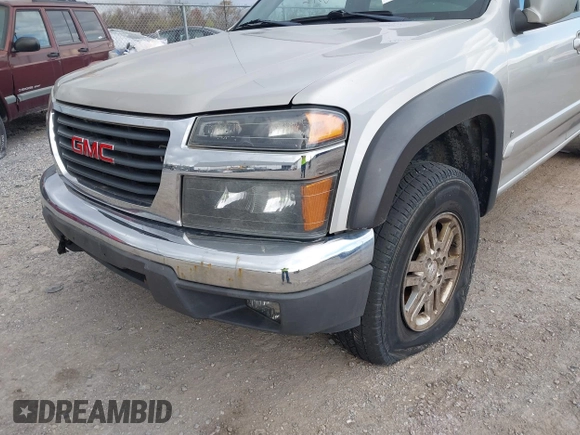 2009 GMC Canyon SLE1 z VIN 1GTDT13E398100890, wystawiony jako IAAI lot #42030572 z przebiegiem 160 181 mil mil oraz . Historia ofert i sprzedaży dostępna na DreamBid. Obrazek 6.