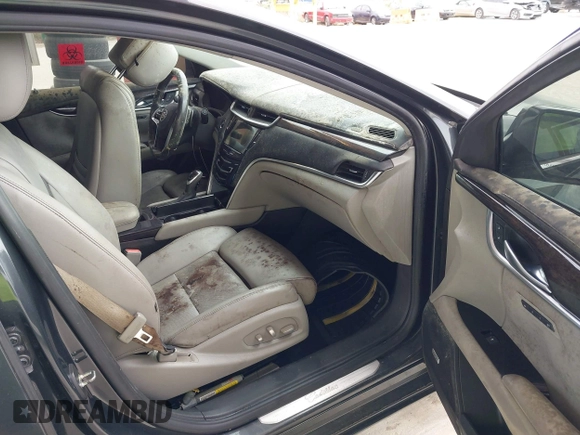 2014 Cadillac XTS Luxury with VIN 2G61M5S33E9217619, listed as a IAAI auction lot 41343003 with 126,303 mi miles. Bid and sale history available at carsss.com. Image 5.